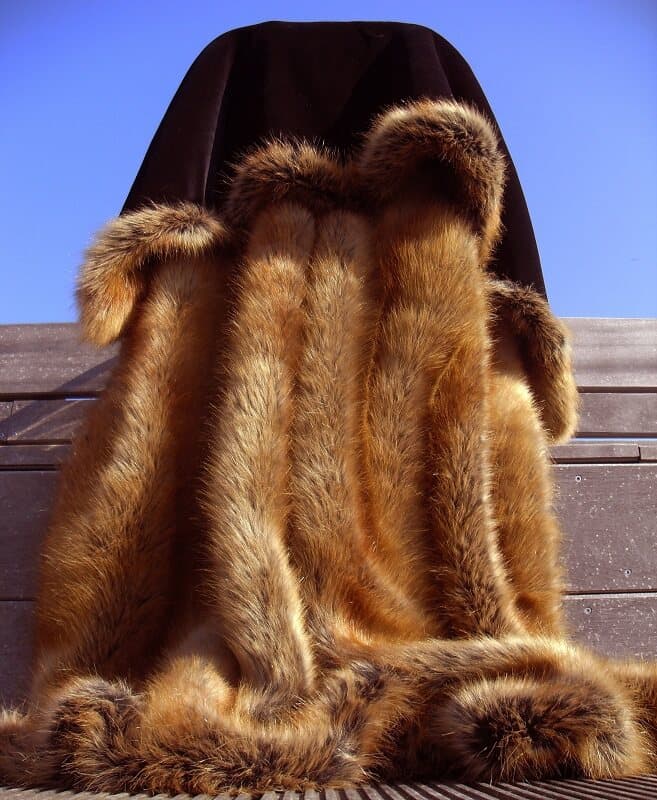 Red-fox-style polyester faux fur draped over a chair